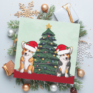 Zwei Corgi-Weihnachtsbaum-Hund-Santa-Hut Cute Feiertagskarte