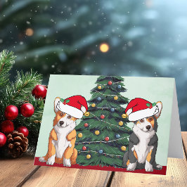Zwei Corgi Weihnachtsbaum Hund Weihnachtsmannmütze Feiertagskarte