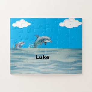 Zwei Delphine spielen Puzzle