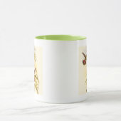 Zwei farbenfrohe Hummingbirds streben nach derselb Tasse (Zentrum)