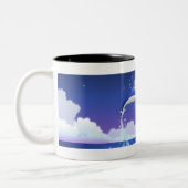 Zwei Flasche-rochen das Delphinherausspringen des Zweifarbige Tasse (Links)