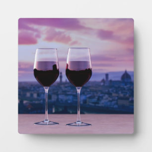 Zwei Gläser Rotwein auf der Silhouette von Florenz Fotoplatte
