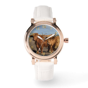 zwei große braune Kühe, Armbanduhr
