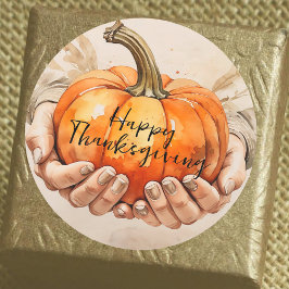 Zwei Hände sanft halten einen Pumpkin-Erntedank Runder Aufkleber