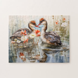 Zwei Haubentaucher zwischen weißen Teichpflanzen Puzzle