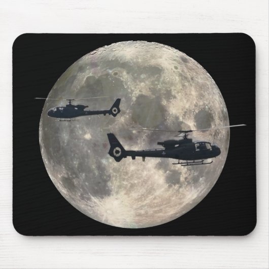 zwei Hubschrauber silhouettiert durch einen Mousepad (Vorne)