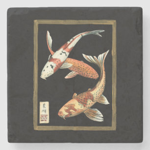 Zwei Japaner Koi Goldfisch auf schwarzem Steinuntersetzer