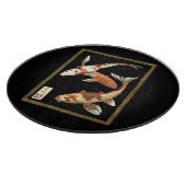 Zwei japanische Koi Goldfish auf schwarzem Hinterg Schneidebrett (Ecke)