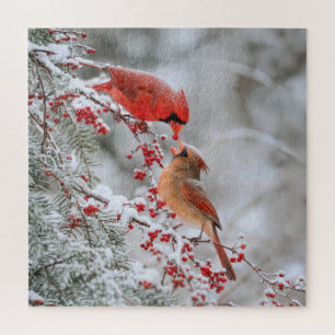 Zwei Kardinäle mit roten Beeren im Winter Puzzle
