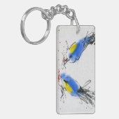 Zwei kleine titmouses, die Korn pecking sind. Schlüsselanhänger (Vorderseite links)