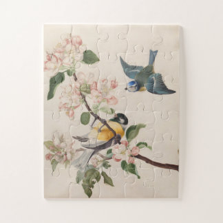 Zwei kleine Vögel in der Nähe eines Apfelblumenzwe Puzzle