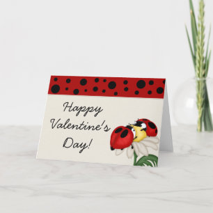 Zwei Ladybugs und eine Valentintagskarte der Blume Feiertagskarte