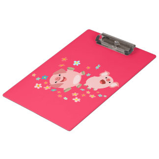 Zwei Niedliche Cartoon Schweine in der Federklamme Klemmbrett