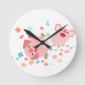 Zwei Niedliche Cartoon Schweine in der Frühlingswa Runde Wanduhr