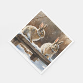 Zwei Niedliche Kaninchen auf der Schnee Serviette (Ecke)