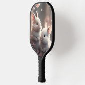 Zwei niedliche Kaninchen mit Sakura Pickleball Pad Schläger (Links)