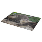 Zwei niedlicher Otter der Otter-| Schneidebrett (Ecke)