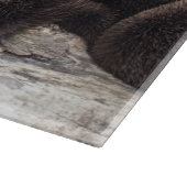 Zwei niedlicher Otter der Otter-| Schneidebrett (Ecke)