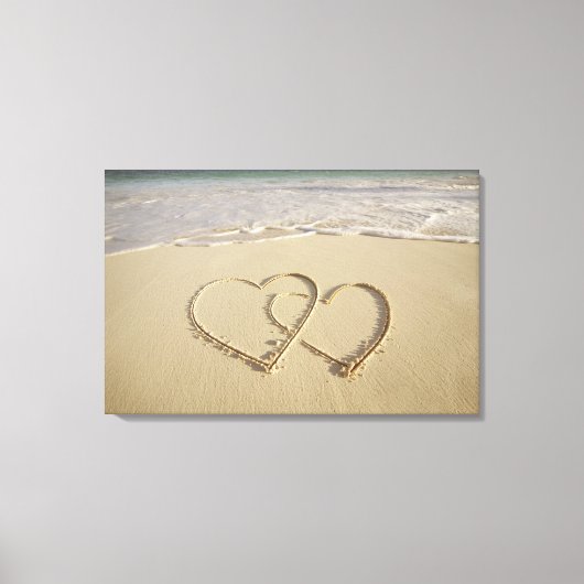Zwei Oberherzen gezeichnet am Strand Leinwanddruck (Vorderseite)