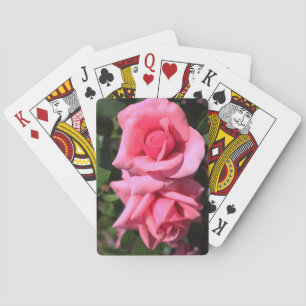 zwei perfekte heiß rosa Rosenblumen. Liebe Spielkarten