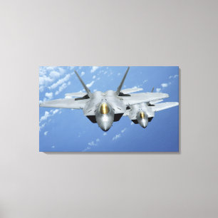 Zwei Raubvögel F-22 fliegen über den Pazifischen Leinwanddruck