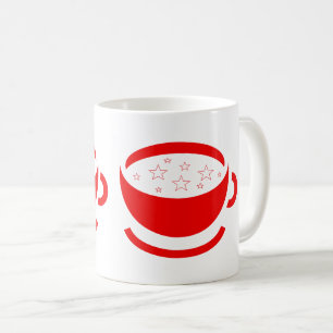 Zwei rote Kaffeetassen mit Sternen
