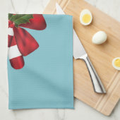 Zwei rote und weiße, festliche Süßigkeiten auf bla Geschirrtuch (Viertel Falte)