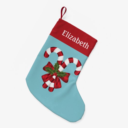 Zwei rote und weiße Süßigkeiten auf blau mit Namen Kleiner Weihnachtsstrumpf (Vorderansicht (hängend))