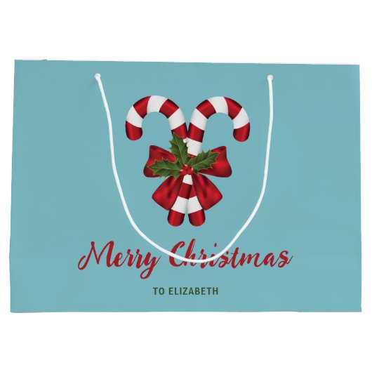 Zwei rote und weiße Süßigkeiten auf blau mit Text Große Geschenktüte (Rückseite)