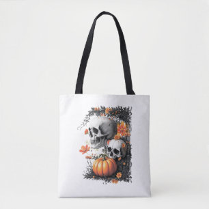 Zwei Schädel und ein Kürbis unter den Blume. Tasche