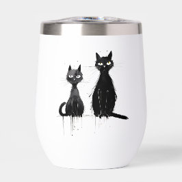 Zwei schwarze Katzen