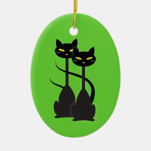 Zwei schwarze Katzen mit langen Hälsen auf Grün Keramik Ornament