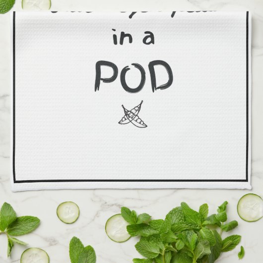 Zwei schwarze mit Augen Erbsen in einem Tee Geschirrtuch (Gefaltet)