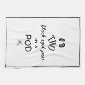 Zwei schwarze mit Augen Erbsen in einem Tee Geschirrtuch (Horizontal)