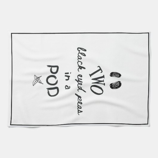 Zwei schwarze mit Augen Erbsen in einem Tee Geschirrtuch (Horizontal)