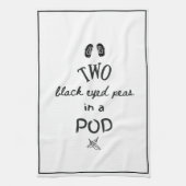 Zwei schwarze mit Augen Erbsen in einem Tee Geschirrtuch (Vertikal)