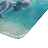 Zwei schwimmende Manatis Schneidebrett (Ecke)