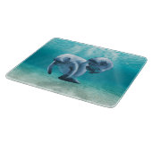 Zwei schwimmende Manatis Schneidebrett (Ecke)