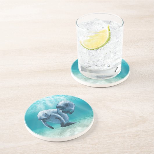 Zwei schwimmende Manatis Untersetzer (Seite)