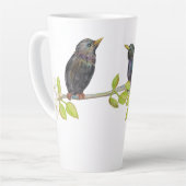 Zwei Starlings auf einem blühenden Zweig im Frühja Milchtasse (Linke Ecke)