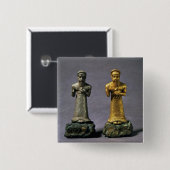 Zwei Statuetten der Männer, die Angebote der Button (Vorne & Hinten)