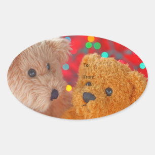 Zwei Teddybären mit Weihnachtsbeleuchtung Ovaler Aufkleber