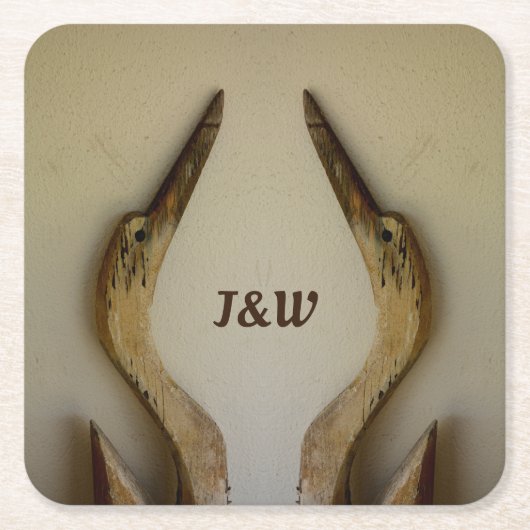 Zwei verwitterte Heronenküste mit Initialen Rechteckiger Pappuntersetzer (Vorderseite)