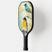 Zwei Vögel, die auf der Baumzweigung sitzen Pickleball Schläger (Links)