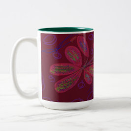 Zweifarbige Tasse mit farbenfroher Blume