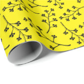 Zweig aus schwarzer Pflanze auf Gelb Geschenkpapier (Rolleneckpunkt)