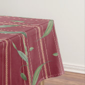 Zweig mit Blättern auf roter Tapete Tischdecke (Beispiel)