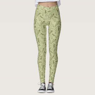 Zweige Früchte und Blätter der Mistel auf grün Leggings