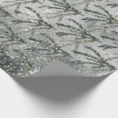 Zweigstelle des grauen Winterspruce unter dem gold Geschenkpapier (Ecke)